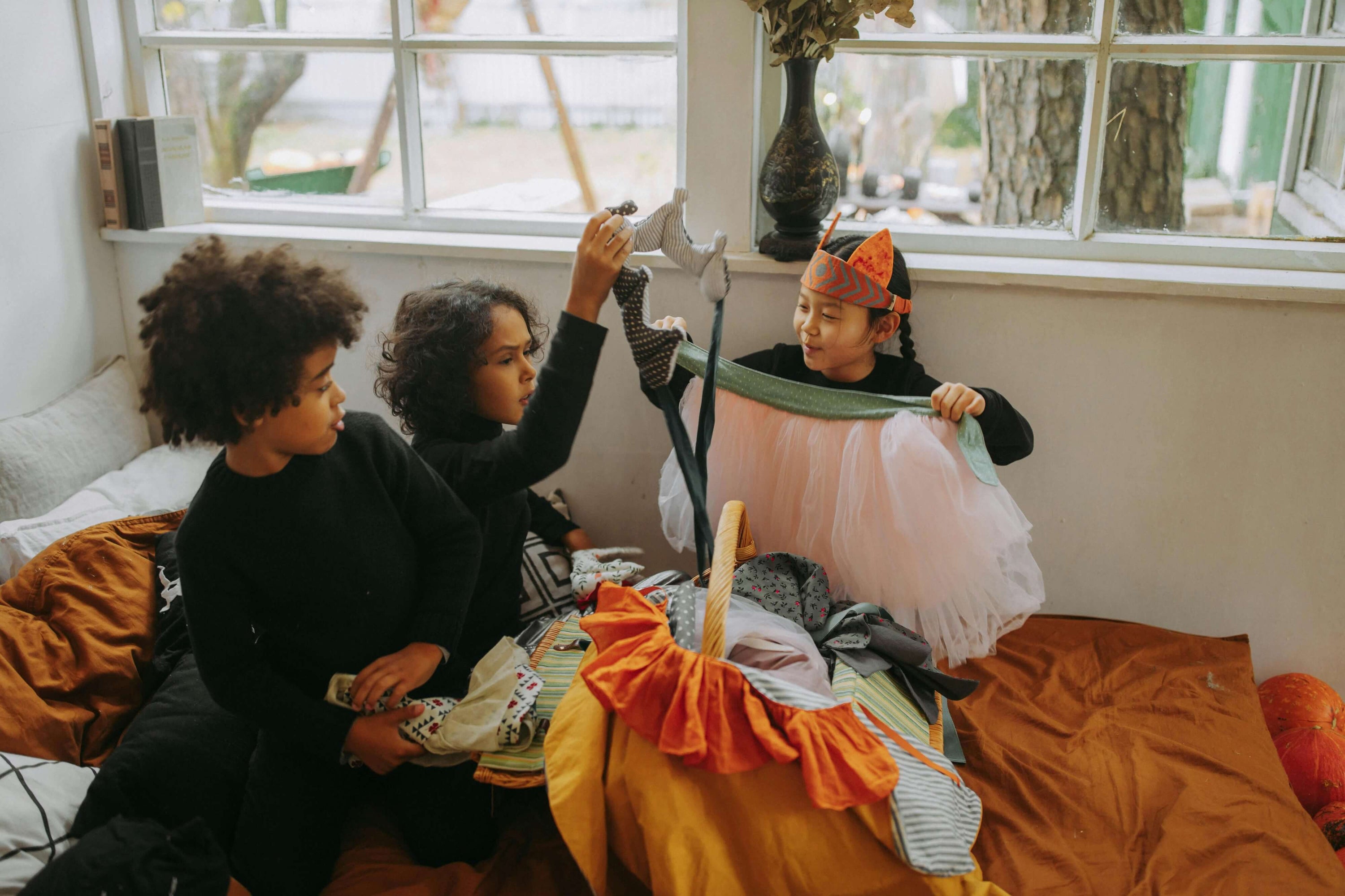 Child with sensory-friendly Halloween costume, including glow-in-the-dark stickers for added visibility.